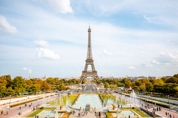 View on the Eiffel tower with fountains during the daylight in Paris