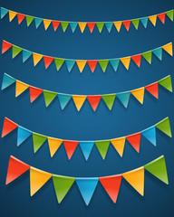 Fototapeta premium Color triangle flags garlands on dark background. Vector clipart