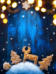 Christmas holiday banner with Christmas candy composition on blue background