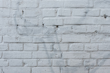 Brick texture with scratches and cracks. It can be used as a background