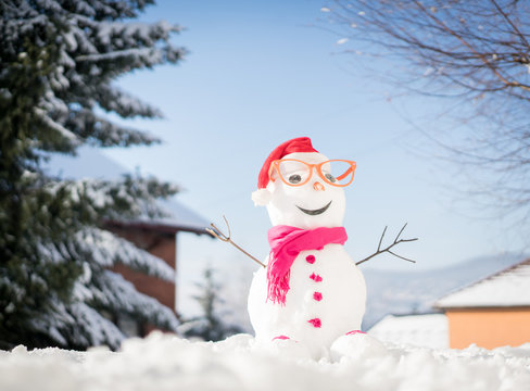 Snowman on snow background