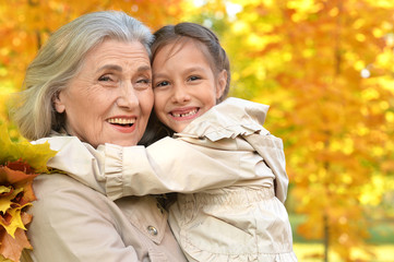 Portrait of a happy grandmother and granddaughter