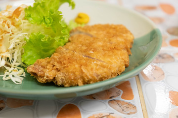 Closed up deep fried meat cutlet.