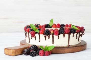 Cake with chocolate and berries