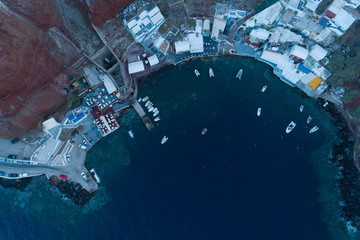 Aerial view of Ammoudi pier in Oia city on Santorini Greece