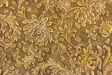 Wall panel with a three-dimensional floral ornament. The element of decor.