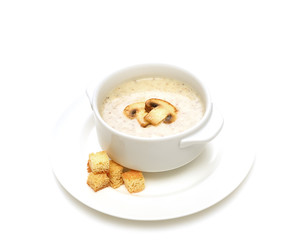 champignon soup with croutons on white background