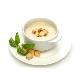 champignon soup with croutons on white background