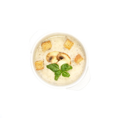 champignon soup with croutons on white background
