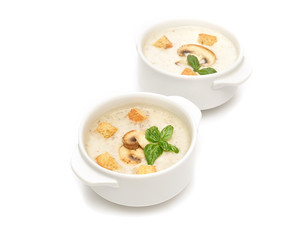 champignon soup with croutons on white background