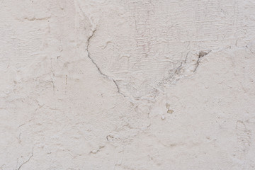 Wall fragment with scratches and cracks. It can be used as a background