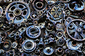 Steampunk background, machine parts, large gears and chains from machines and tractors.