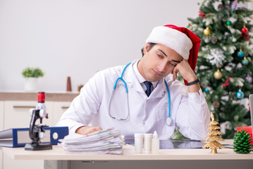 Doctor on the shift on christmas eve