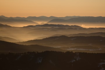 Sunrise above mountains