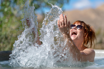 Girl laughing in hot tub