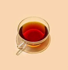 cup of tea with long shadow