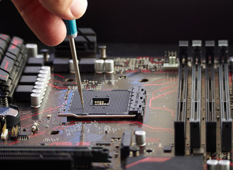 Fototapeta na wymiar Computer motherboard repair