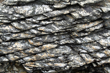 shinning surface and texture of fine grained metamorphic rock, Ushuaia, Argentina