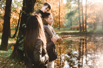 Fototapeta premium happy family in autumn park