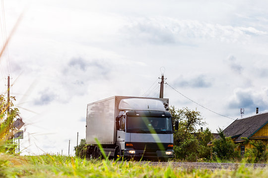 Off-road car truck is going on a country road