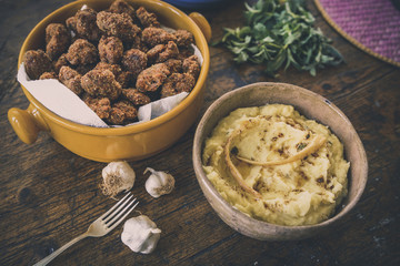 Homemade meatballs and mash potatoes with garlic burnt butter.