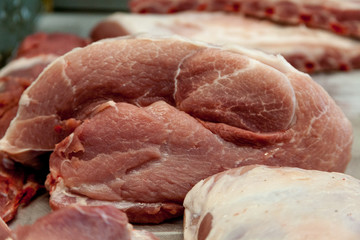 Raw beef meat on a cutting board