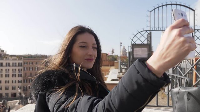 sexy pretty woman taking selfie outdoor-slow motion