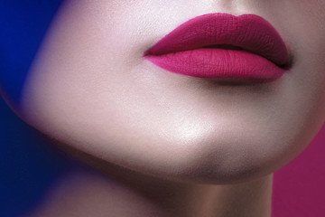 Lips of young beautiful black woman with clean perfect skin