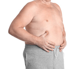 Naklejka premium Fat senior man on white background, closeup. Weight loss