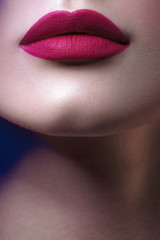 Lips of young beautiful black woman with clean perfect skin