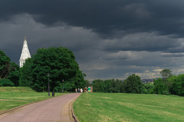 Ascension Church in Kolomenskoye Park through the spring green trees. Moscow, Russia.