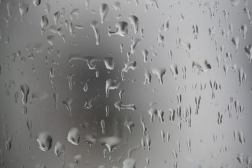 Rain drops on window glasses surface Natural Pattern of raindrops.