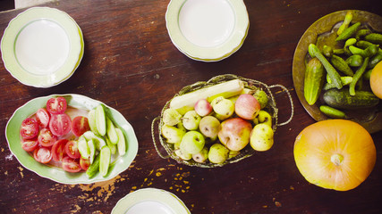 Top view. Autumn. Old table with fruits and vegetables