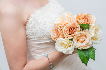 white bridal with roses bouquet