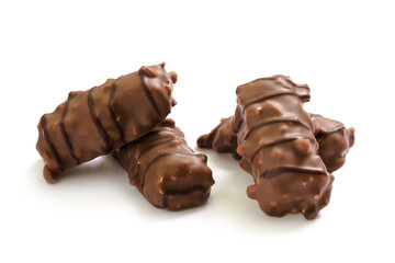 Assortment of chocolate candies from black, milk and white chocolate with nuts and marzipan