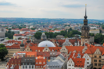 Fototapeta na wymiar Scenic aerial view of rooftops in Dresden, Germany with tower of Saxony Dresden Castle