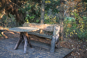 table and bench from trunks of trunks and roots of trees of ancient Slavs during the period of great migration of peoples