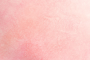 watercolor paper background with red pink paint. water spread