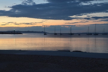 Morning sunrise at a small port with a silent ocean scenery in France