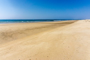 Deserted beach, in Algarve, Portugal.