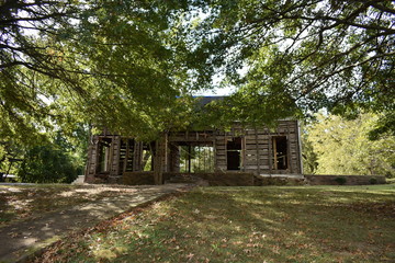 Condemned demo house in sunlight