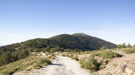 The walk from Cercedilla to the peak of Aguila, Madrid, Spain. Panoramic Sierra de Guadarrama National Park. Sunrise views