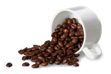 Mug full of, and surrounded by, coffee beans
