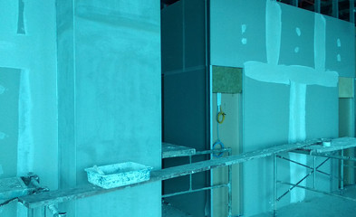 KUALA LUMPUR, MALAYSIA -MARCH 29, 2018: Drywall installation work in progress by construction...