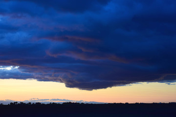 Fototapeta na wymiar Dark cloud at dusk