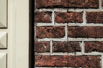 White door and brick wall in Amsterdam