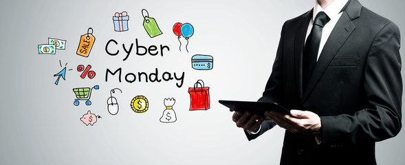 Cyber Monday with man holding a tablet computer