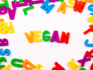 Fototapeta premium VEGAN in Buchstaben