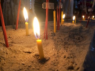 Candles light in the dark