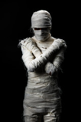 Studio shot portrait  of young man in costume  dressed as a halloween  cosplay of scary mummy pose...